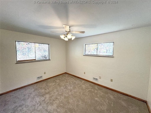 1526 Trace Fork Rd, South Charleston, WV 25309 - carpeted empty room with baseboards and a ceiling fan