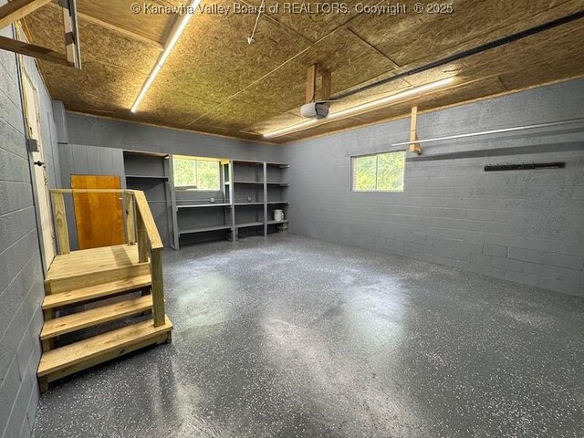 1526 Trace Fork Rd, South Charleston, WV 25309 - garage with a garage door opener and concrete block wall