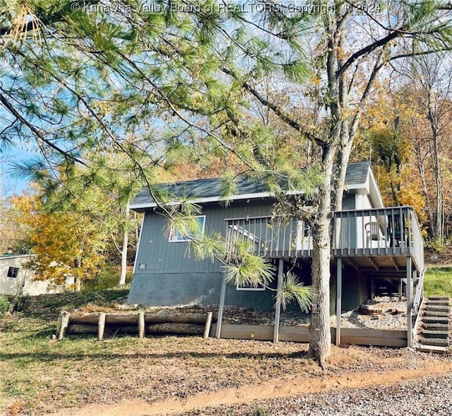 exterior space featuring a wooden deck