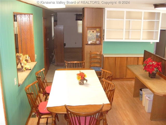 dining area with light hardwood / wood-style floors