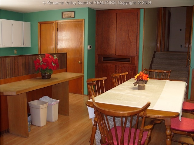 dining area with light hardwood / wood-style floors