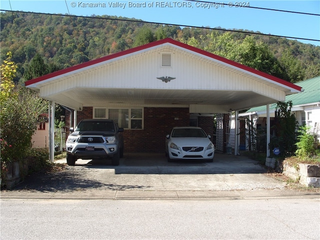 view of car parking featuring a carport