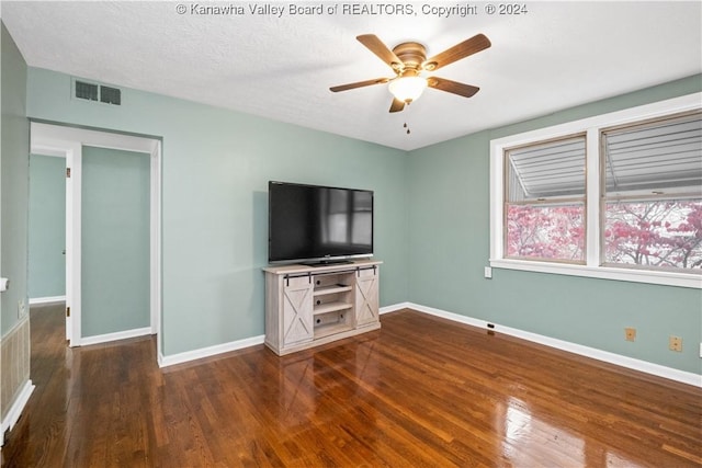 302 Kenna Dr, South Charleston, WV 25309 - unfurnished living room with dark wood-type flooring and ceiling fan
