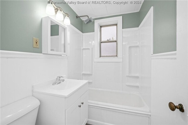 302 Kenna Dr, South Charleston, WV 25309 - full bathroom with vanity, washtub / shower combination, and a wainscoted wall