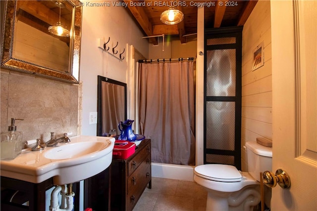 bathroom with toilet, wood ceiling, a shower with shower curtain, and tile patterned flooring