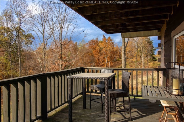 wooden balcony featuring a wooden deck