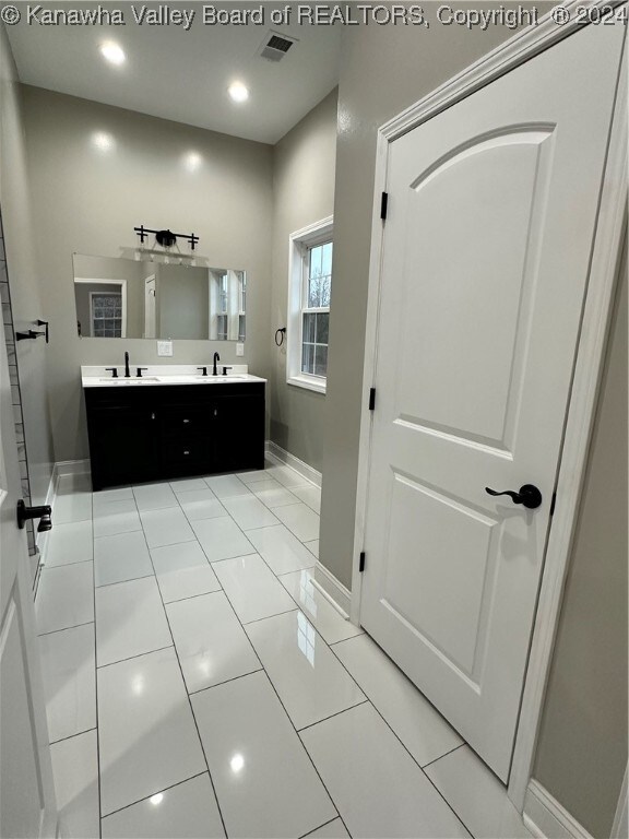 bathroom featuring vanity and tile patterned floors