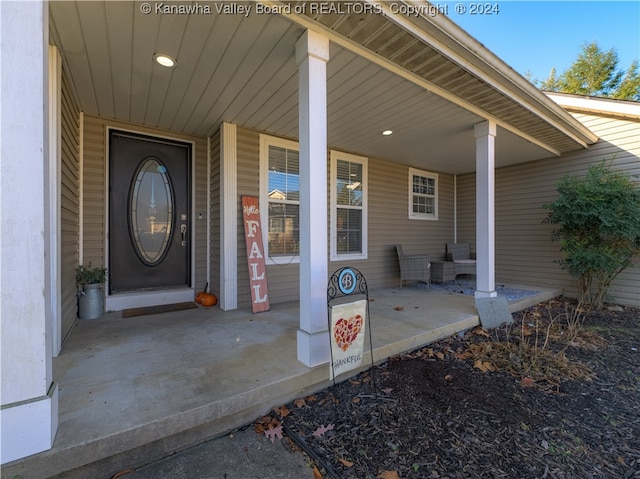 property entrance with a porch