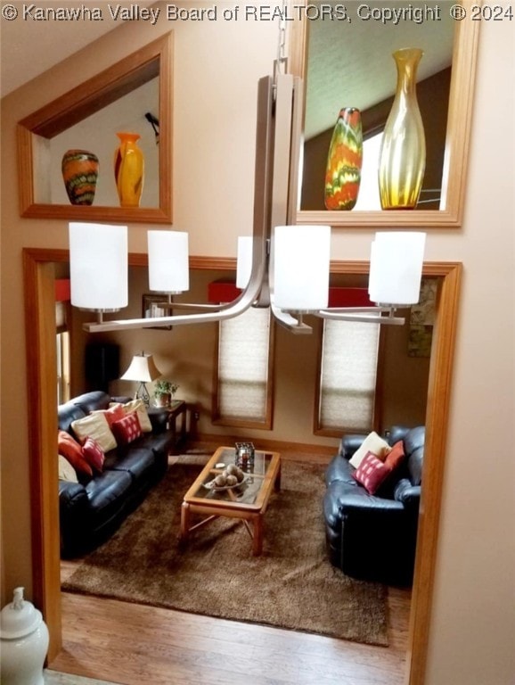 sitting room featuring hardwood / wood-style flooring