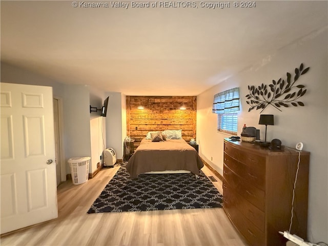 bedroom featuring light wood-type flooring