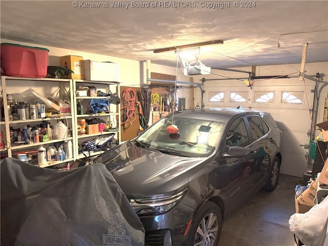 garage featuring a garage door opener