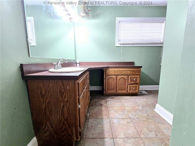 bathroom featuring vanity and tile patterned floors