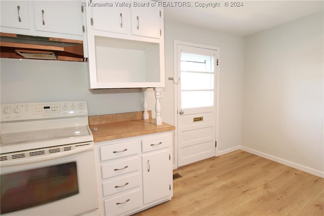 kitchen with white cabinetry, white range, and light hardwood / wood-style flooring