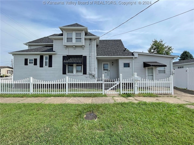 view of front of house with a front lawn