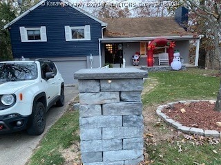 tri-level home featuring a garage