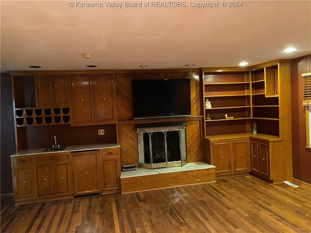 interior space featuring hardwood / wood-style flooring and sink