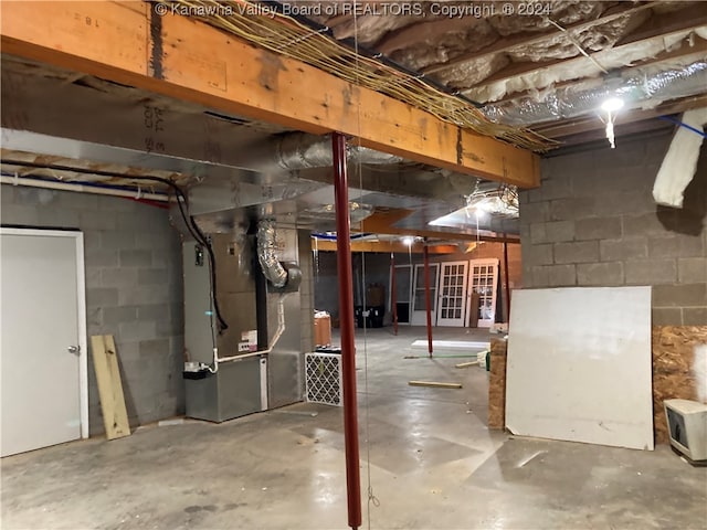 basement featuring heating unit