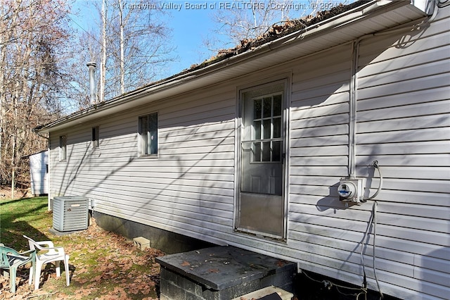 view of home's exterior with central air condition unit