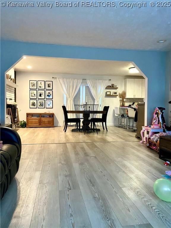 dining area with wood-type flooring