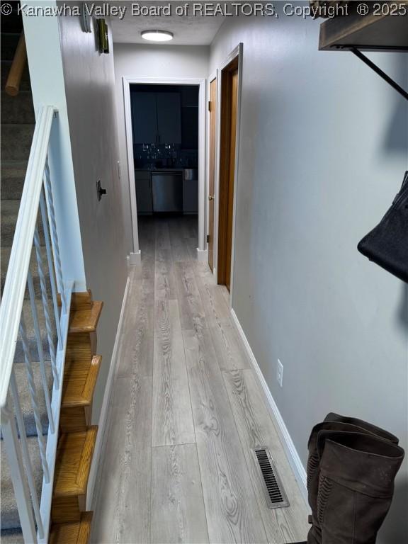 hallway featuring light hardwood / wood-style floors