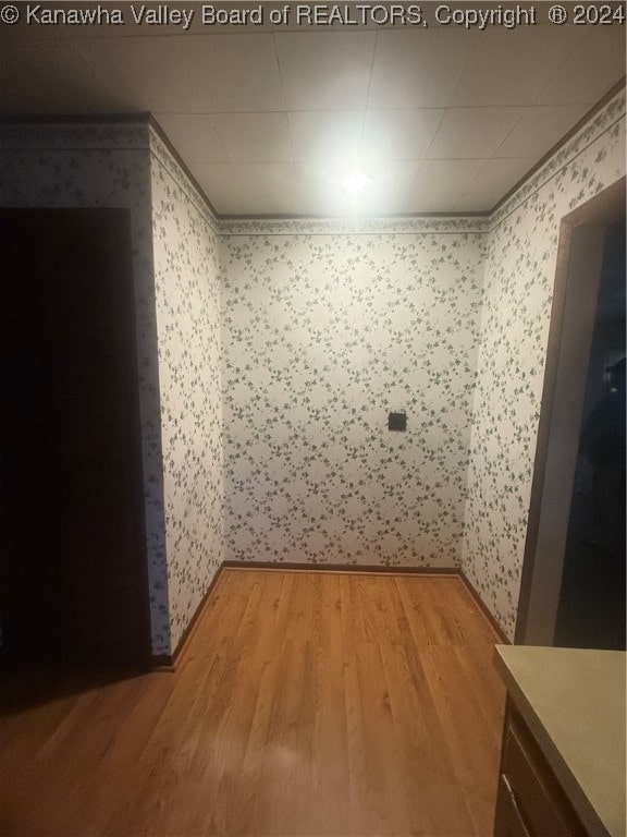 spare room with hardwood / wood-style floors