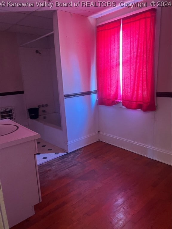 bathroom with vanity and wood-type flooring