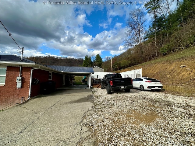 view of car parking with a carport