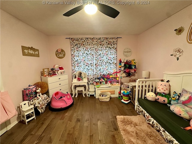 game room featuring ceiling fan and dark wood-type flooring