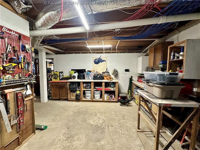 basement featuring a workshop area