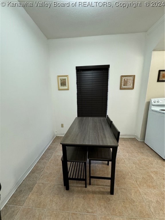 dining space with washer / clothes dryer