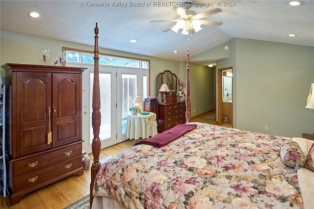 bedroom featuring access to exterior, ceiling fan, light hardwood / wood-style floors, and lofted ceiling