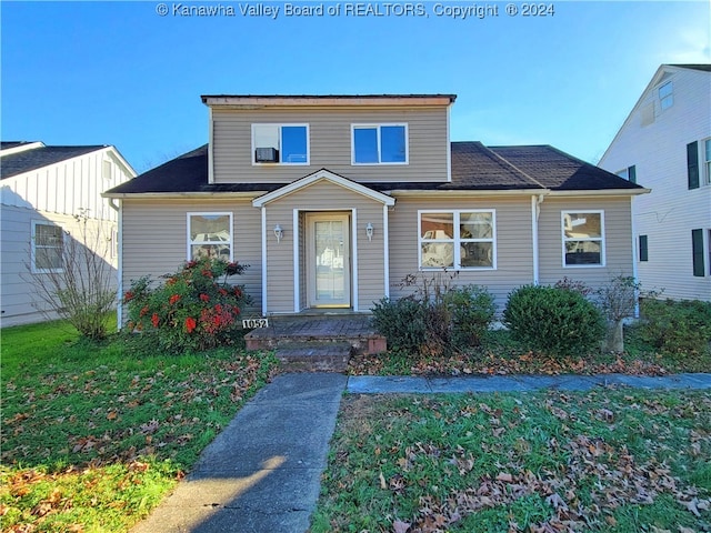 view of front facade with a front lawn