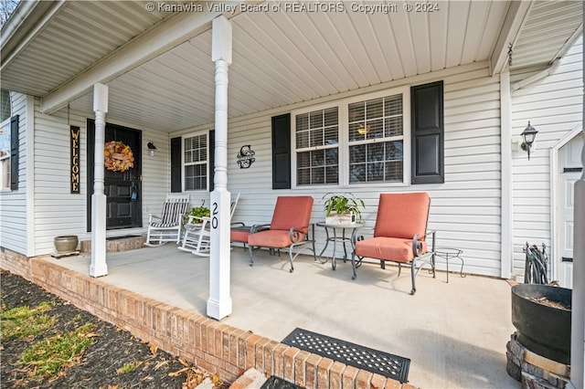 view of patio featuring covered porch