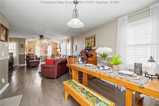 20 Poplar Hls, Hurricane, WV 25526 - dining room with wood finished floors, a ceiling fan, and a fireplace