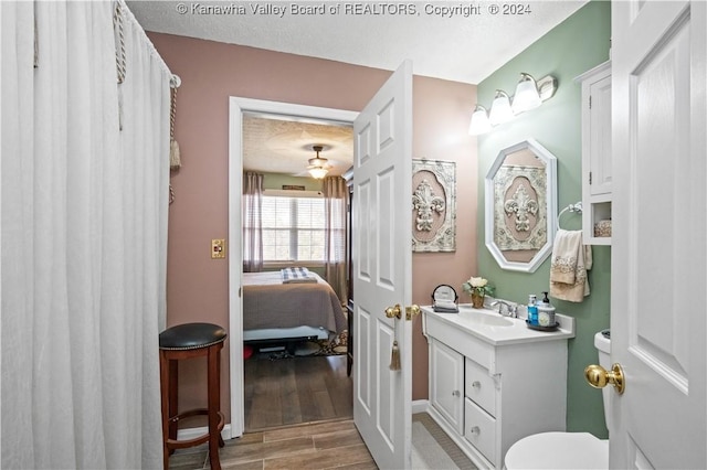 20 Poplar Hls, Hurricane, WV 25526 - ensuite bathroom with vanity and wood finished floors