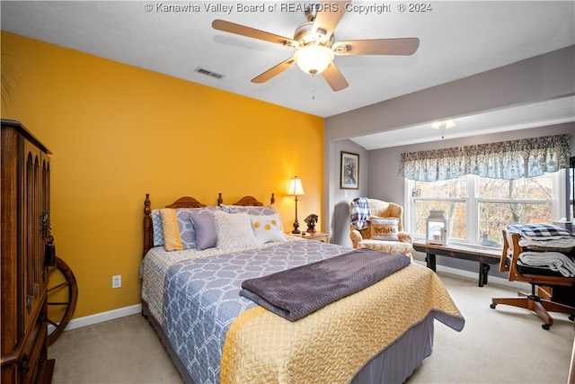 carpeted bedroom with ceiling fan