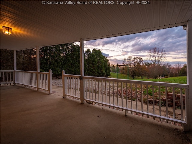 view of patio terrace at dusk