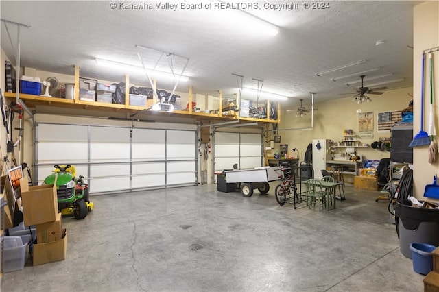 garage with ceiling fan and a garage door opener