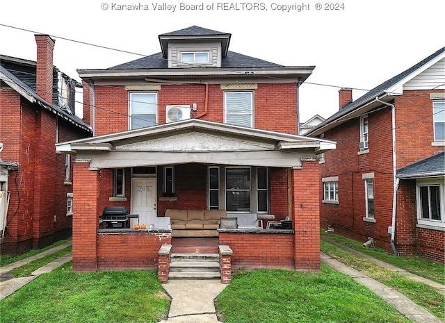 view of property featuring a porch