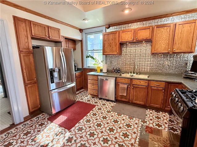 kitchen featuring tasteful backsplash, crown molding, sink, and appliances with stainless steel finishes