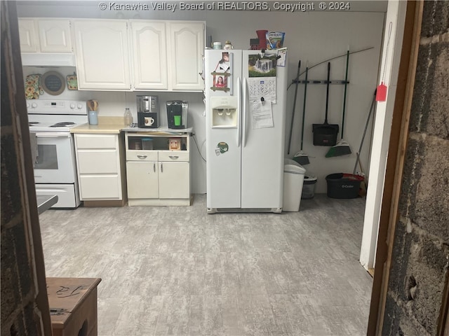 kitchen featuring white cabinetry, exhaust hood, white appliances, and light wood-type flooring