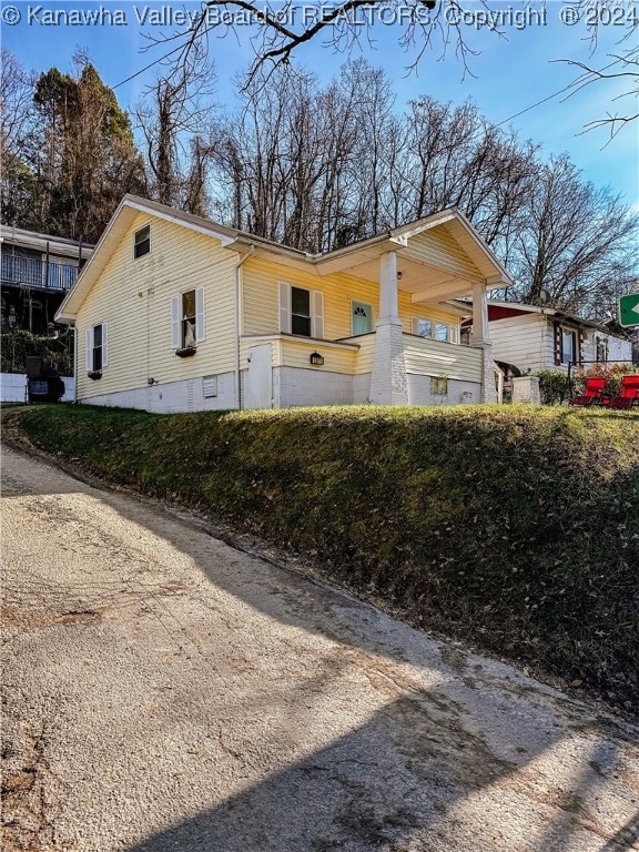 view of home's exterior featuring a porch