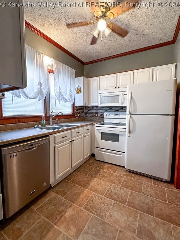 kitchen featuring sink, tasteful backsplash, a textured ceiling, white appliances, and white cabinets