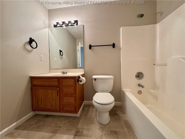 full bathroom featuring vanity, toilet, and bathtub / shower combination