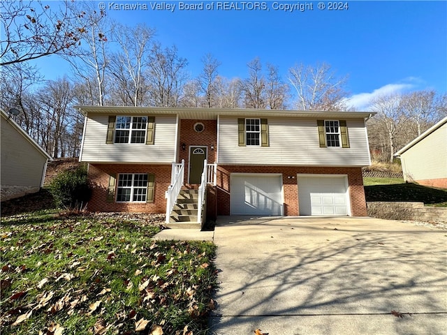 raised ranch featuring a garage