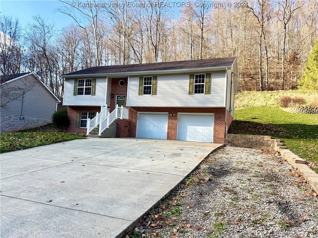 split foyer home featuring a garage