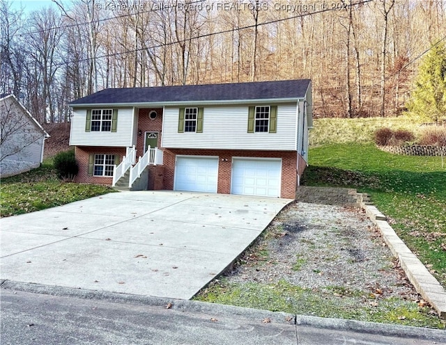 raised ranch featuring a garage