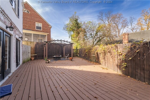 wooden deck with a pergola