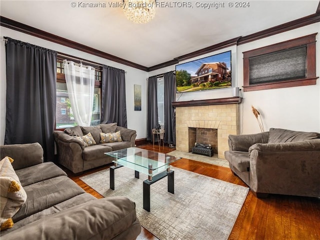 1515 Lee St E, Charleston, WV 25311 - living room with wood-type flooring, crown molding, and a brick fireplace