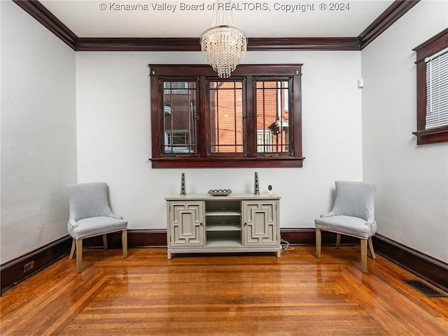 1515 Lee St E, Charleston, WV 25311 - sitting room featuring dark hardwood / wood-style floors, an inviting chandelier, and ornamental molding